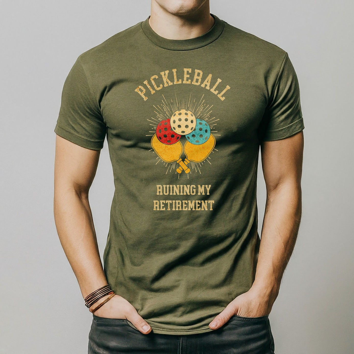 a man is wearing a pickleball t - shirt