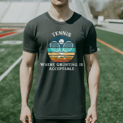 a man standing on a field wearing a tennis shirt