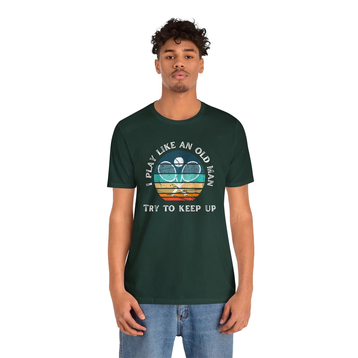 a man wearing a t - shirt that says play like an old man try to