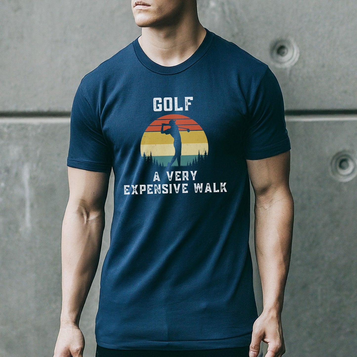a man wearing a blue golf t - shirt with a sunset design