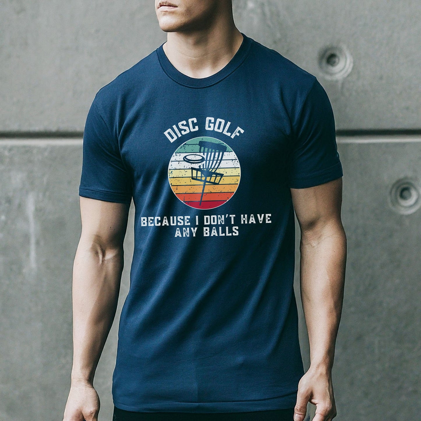 a man wearing a disc golf tee shirt