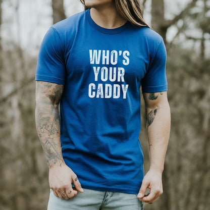 a man wearing a blue shirt that says who's your caddy