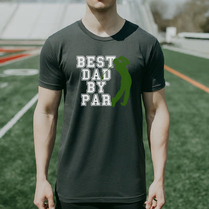 a man standing on a field wearing a t - shirt that says best dad by