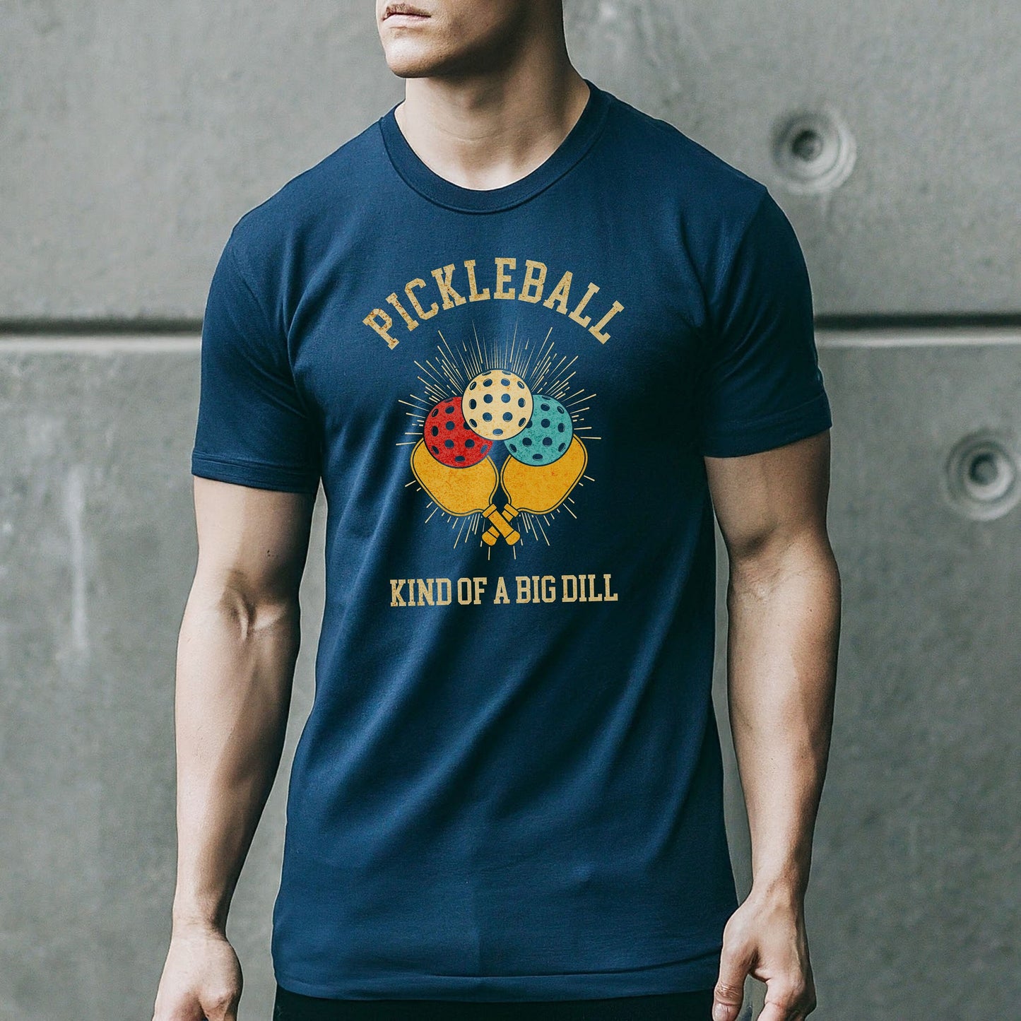 a man wearing a pickleball kind of a big dill t - shirt