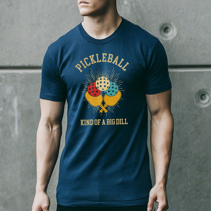 a man wearing a pickleball kind of a big dill t - shirt