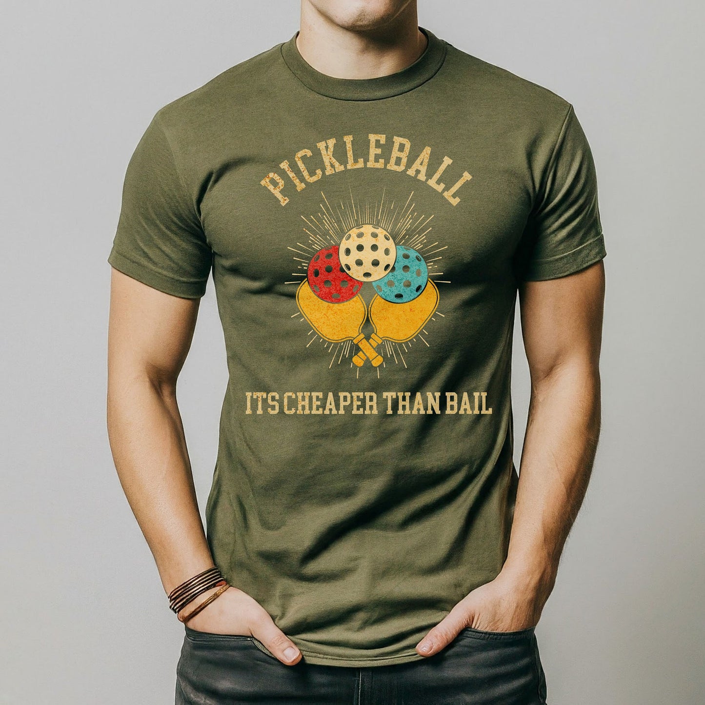 a man is wearing a pickleball t - shirt
