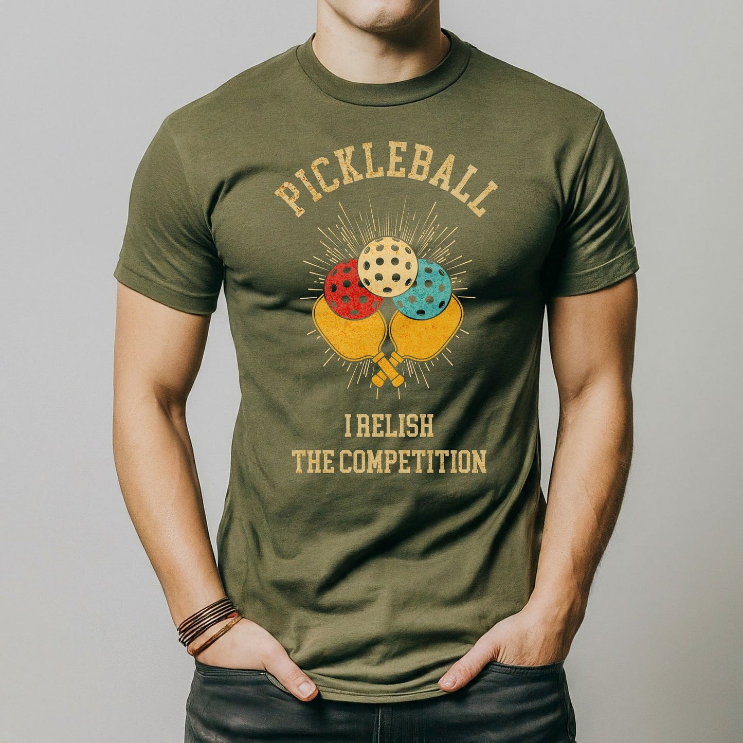 a man is wearing a pickleball t - shirt
