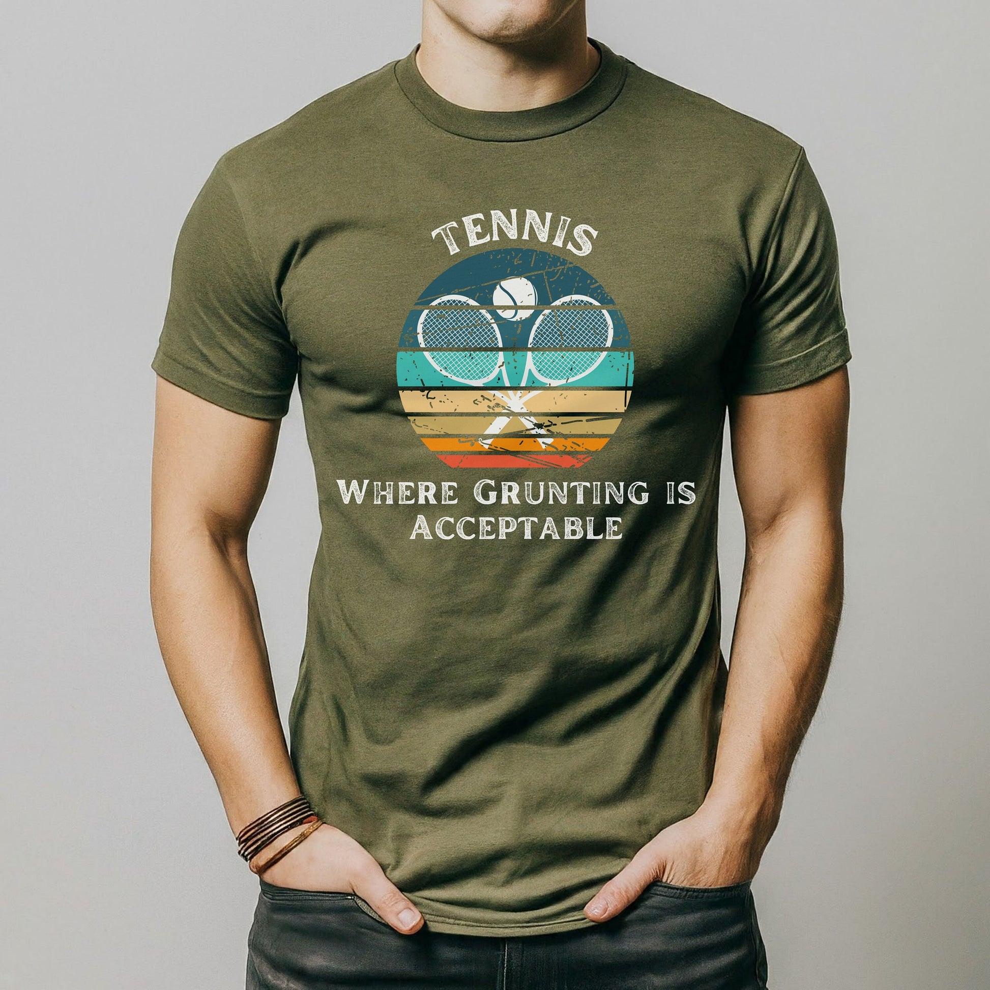 a man wearing a tennis racket t - shirt