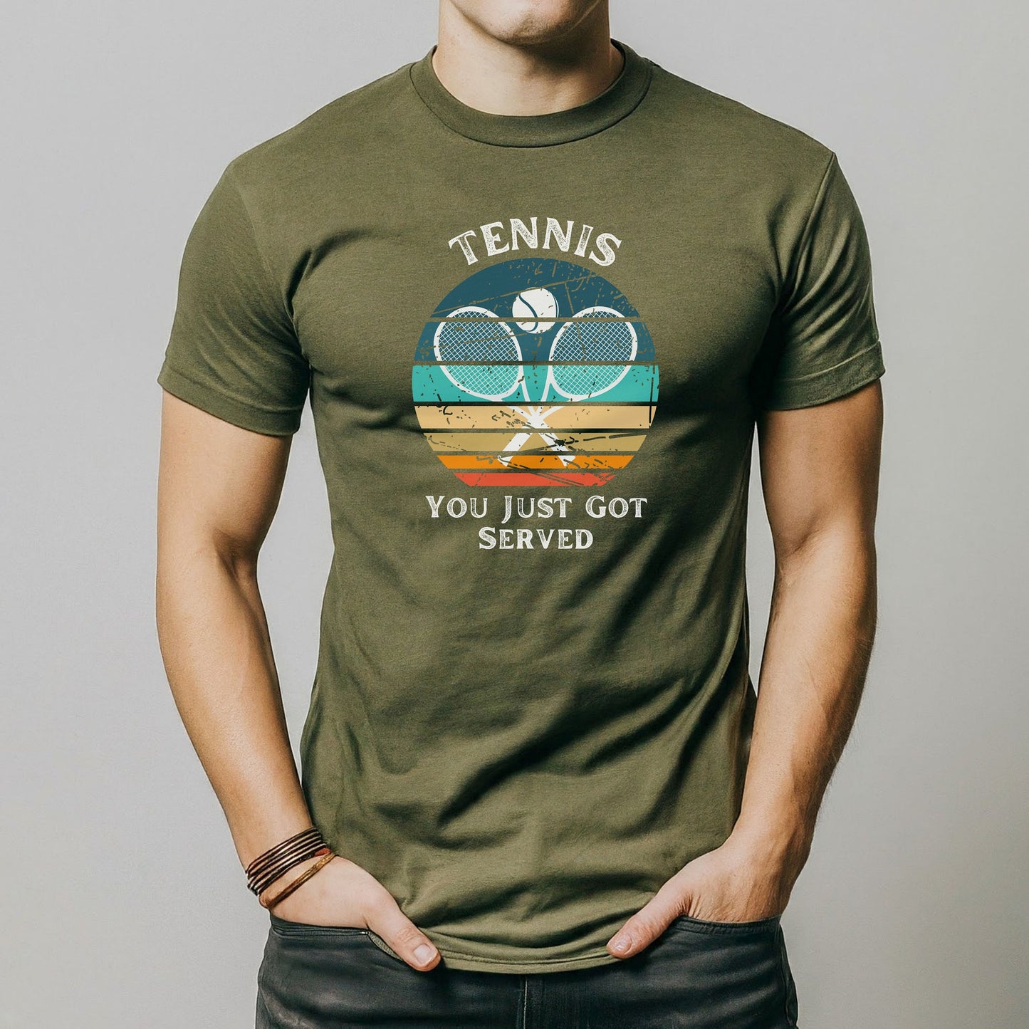a man wearing a tennis racket t - shirt