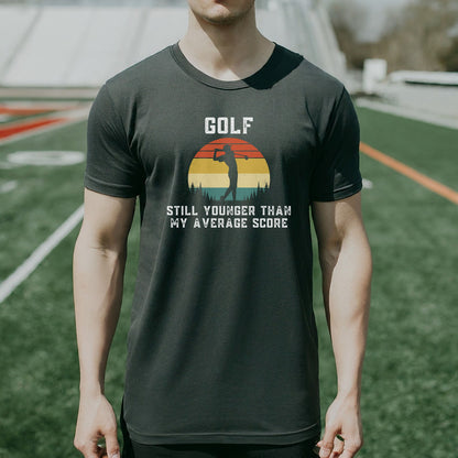 a man standing on a field wearing a golf shirt