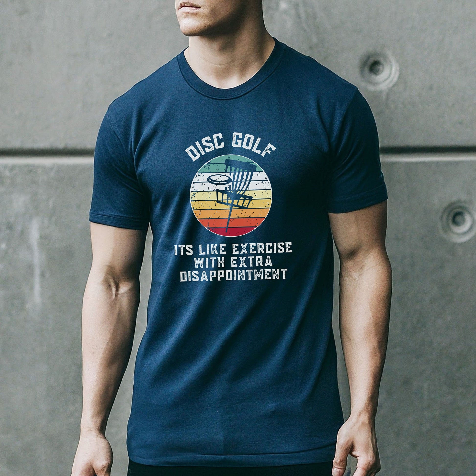 a man wearing a disc golf t - shirt