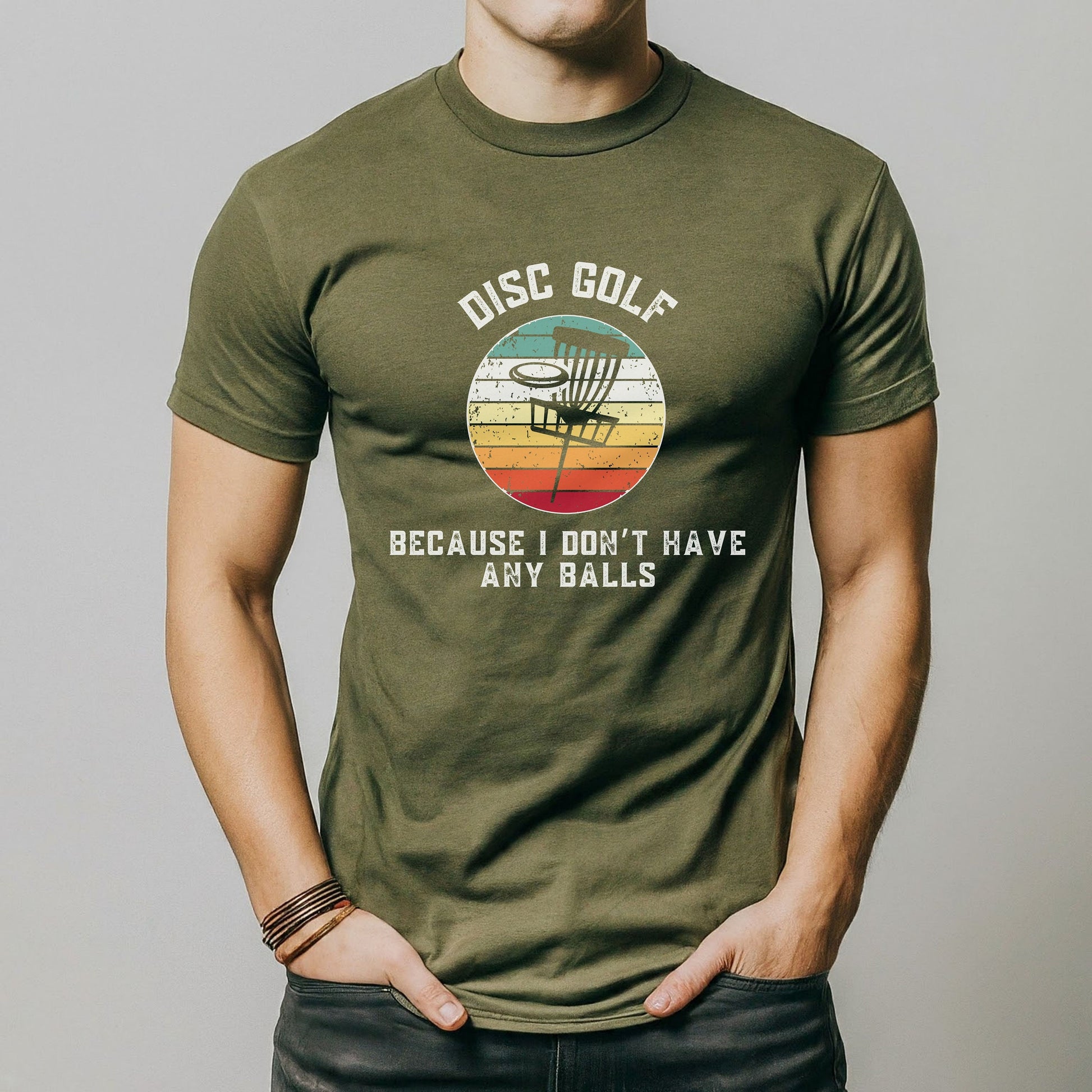 a man is wearing a disc golf t - shirt