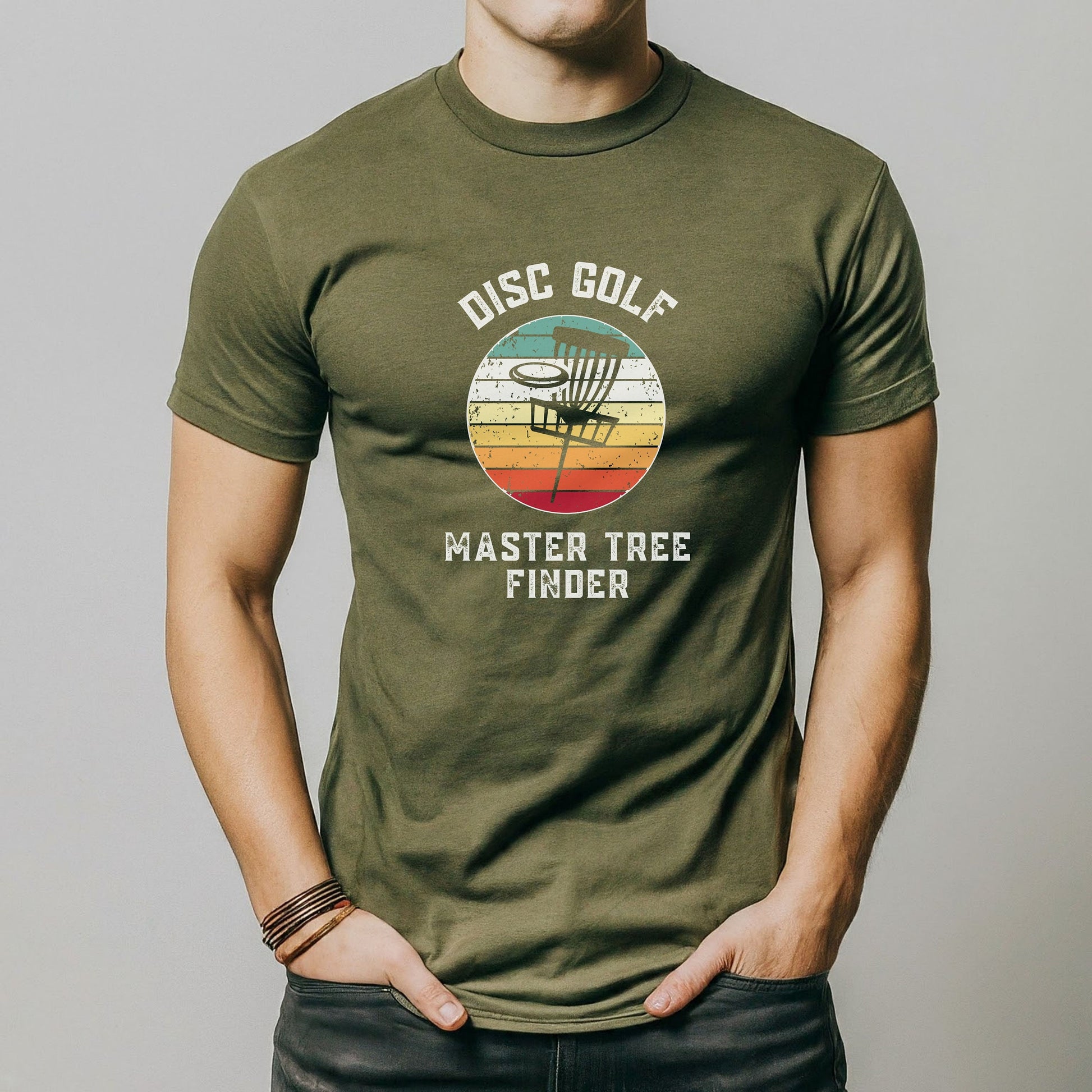 a man wearing a disc golf tee shirt