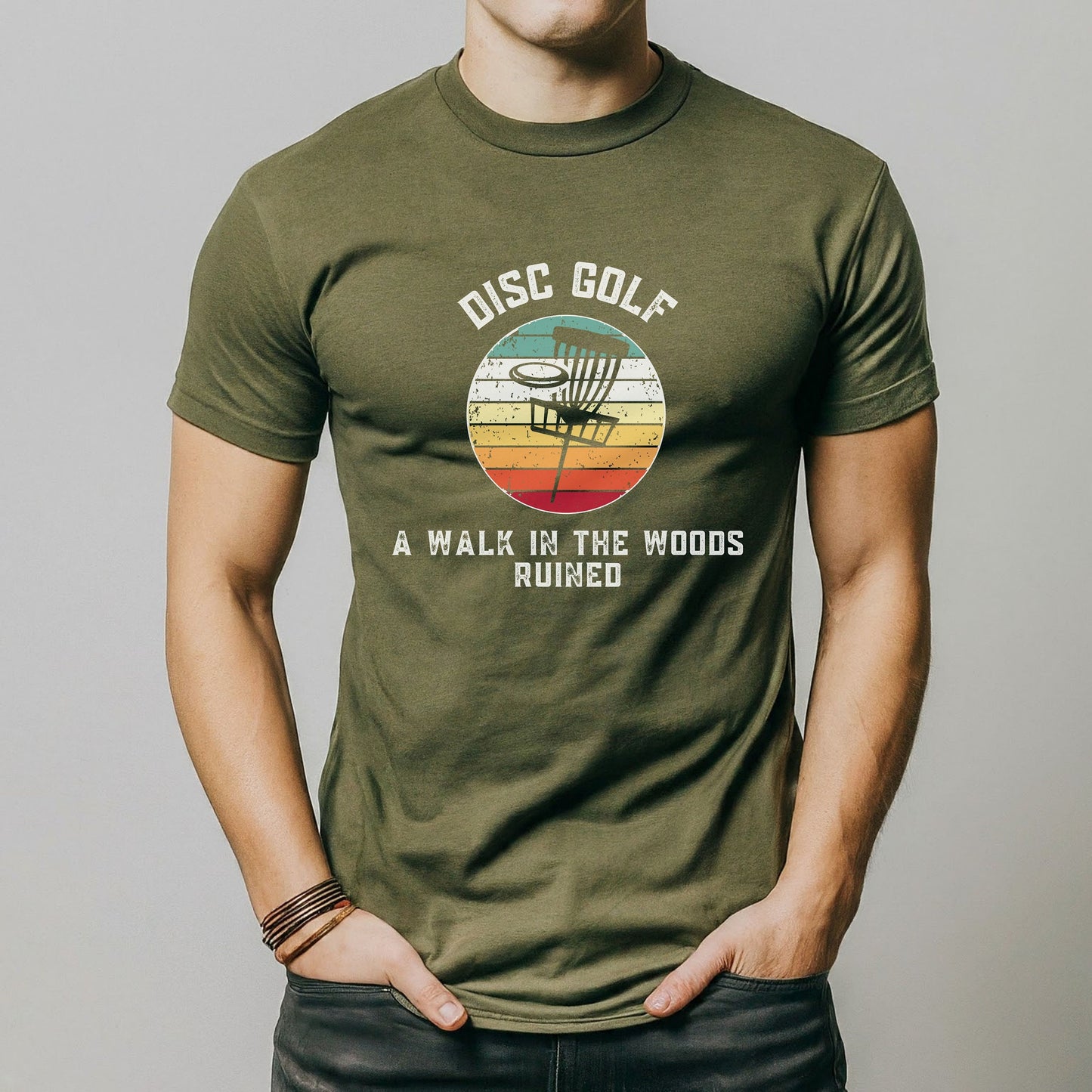 a man wearing a disc golf t - shirt