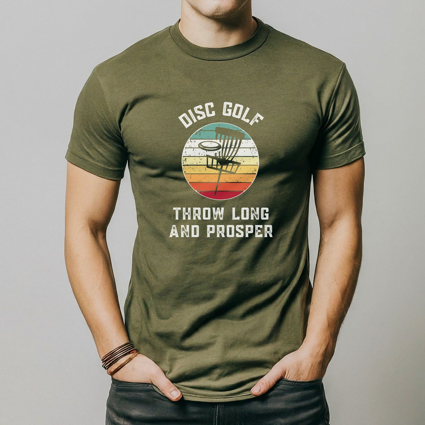 a man wearing a green disc golf shirt
