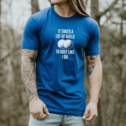 a man with long hair wearing a blue shirt