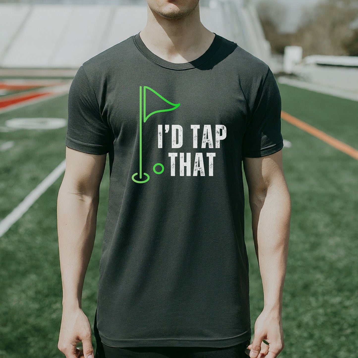 a man wearing a t - shirt that says i'd tap that