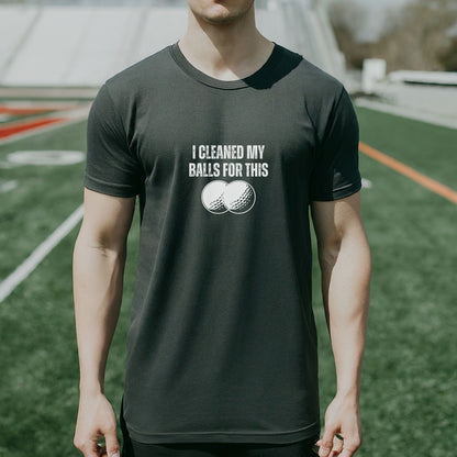 a man standing on a field holding a frisbee