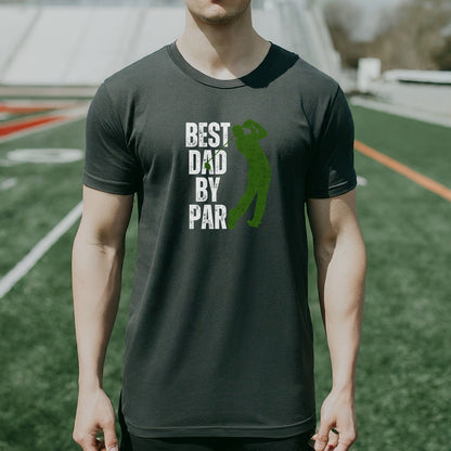 a man standing on a field wearing a shirt that says best dad by par