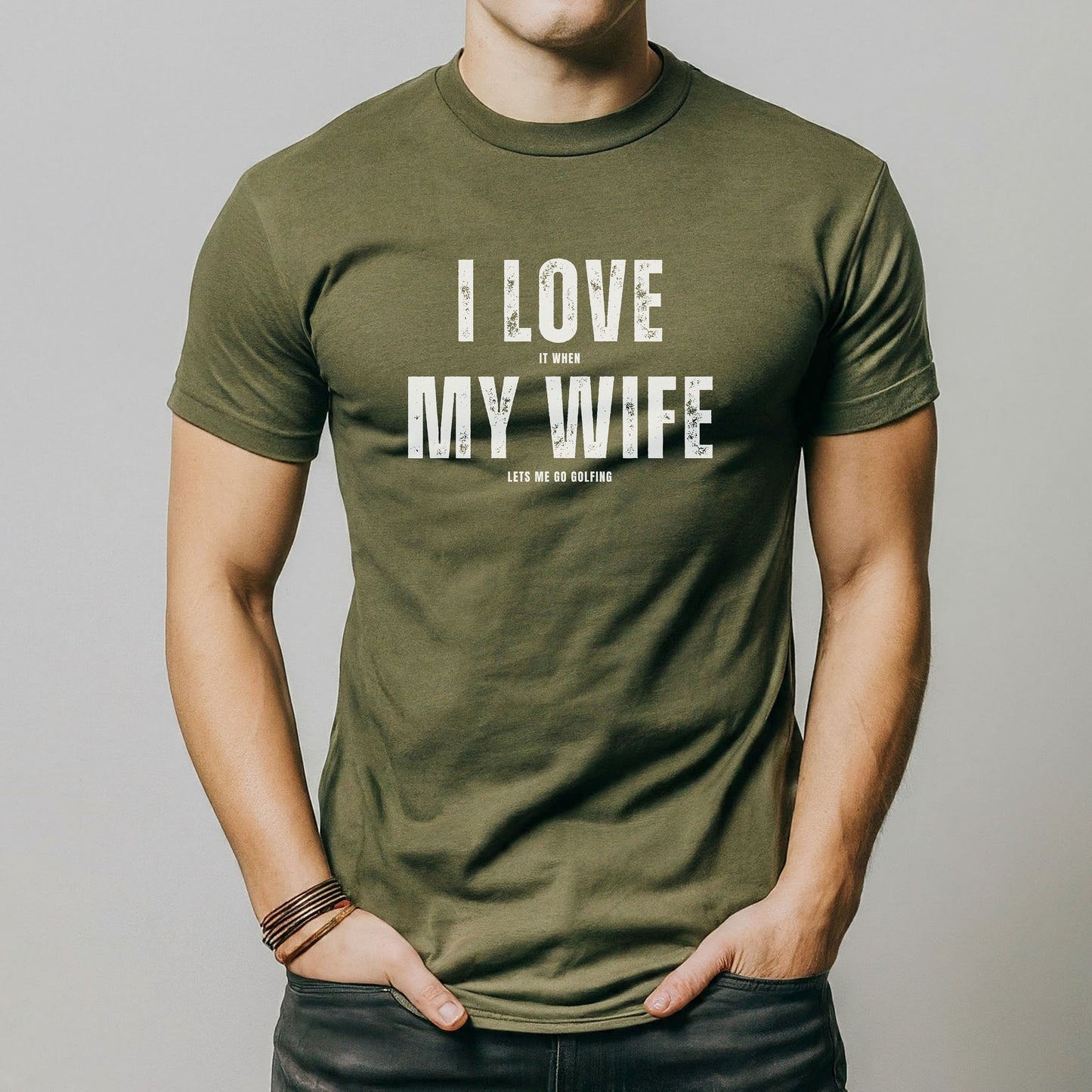 a man wearing a t - shirt that says i love my wife
