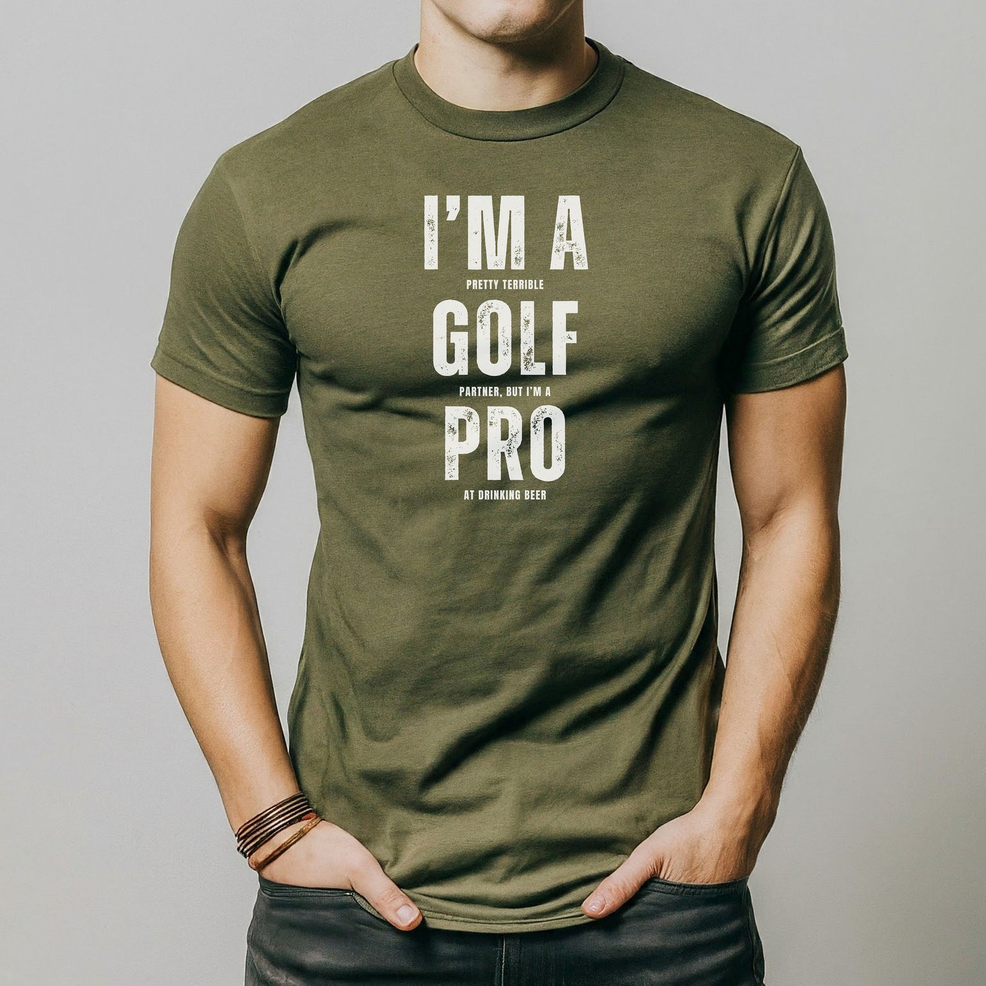 a man wearing a t - shirt that says i'm a golf pro