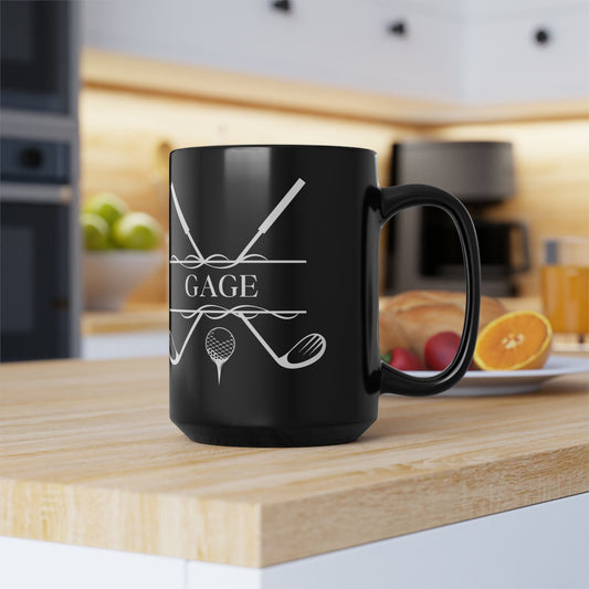a black mug sitting on top of a wooden counter