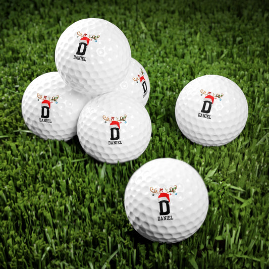 a group of golf balls sitting on top of a lush green field