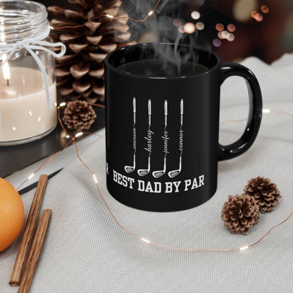 a black coffee mug sitting on top of a table
